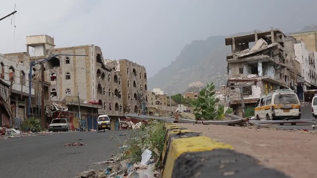 The effects of destruction on people's homes due to clashes with various weapons between the Popular Resistance and Al-Houthi militias in Taiz City .