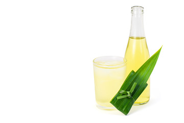 bottle and glass of  pandan juice tea with green leaf isolated on white background.