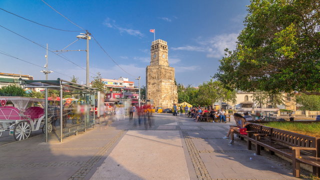 Clock tower in the Historic part of Antalya Kaleici timelapse , Turkey. Old town of Antalya is a popular destination among tourists