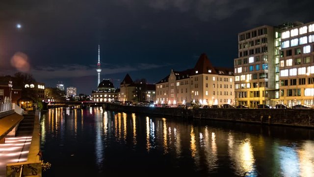 Berlin city 4K timelapse. View of Museum Island with famous TV tower and Spree river in center of Berlin at night.
