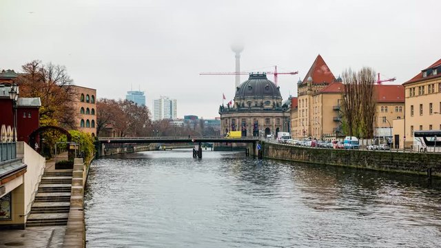 Berlin city 4K timelapse. View of Museum Island with famous TV tower and Spree river in center of Berlin on a foggy day.