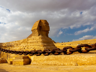 Great Sphinx of Giza with chain in the foreground in Egypt