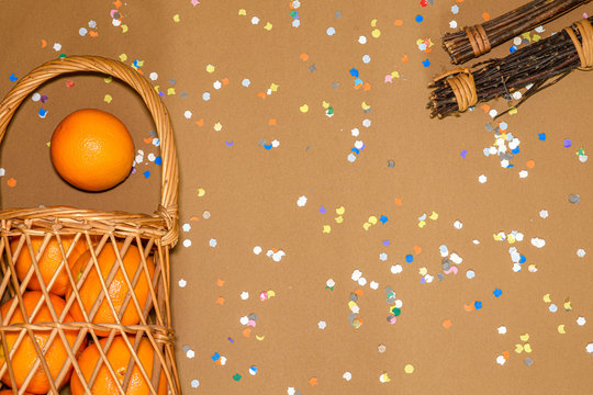 Fond carnaval avec panier de gille avec des oranges et des ramons