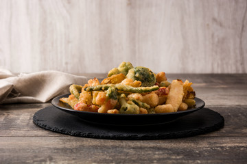 Japanese vegetable tempura on black plate