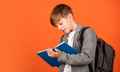 Basic education. Skills and knowledge. Student with book. Learning foreign language. Education for kids. Child care. School education concept. Homework. Writing notes. Nerd lifestyle. Boy studying