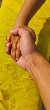 hands with autumn leaves
