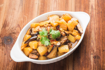 Stewed chicken with potato and mushroom