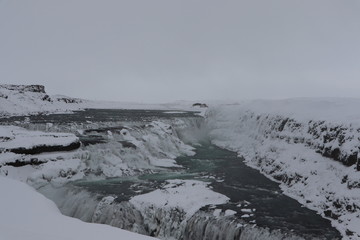 Wodospad zimą, Islandia