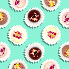 Sweet pattern. Top view handmade chocolate candies with nuts