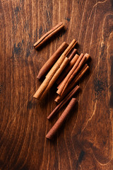 Cinnamon Sticks on a rustic brown background. Close up.