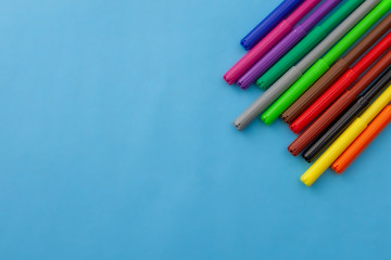 Color pen on blue paper background