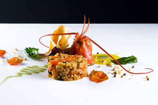 Fregula con aragosta e frutti di mare