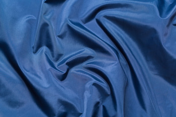 Blue fabric cloth texture. abstract texture background with soft waves.