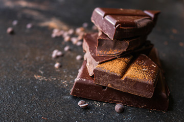 chocolate delicious cocoa dessert, pieces of sweets, menu concept. food background top view. copy space