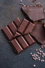 chocolate delicious cocoa dessert, pieces of sweets, menu concept. food background top view. copy...