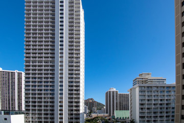 Fototapeta na wymiar Buildings with Diamond Head in the background in Waikiki Oahu Hawaii