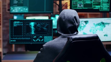 Wanted cyber criminal wearing a white mask