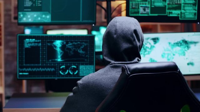Wanted cyber criminal wearing a white mask