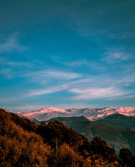 Obraz na płótnie Canvas Sierra Nevada sunset with the Veleta peak and the ski slopes of Prado Llano