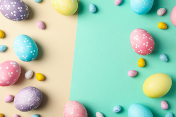 Fototapeta na wymiar Easter eggs on two tone background, space for text