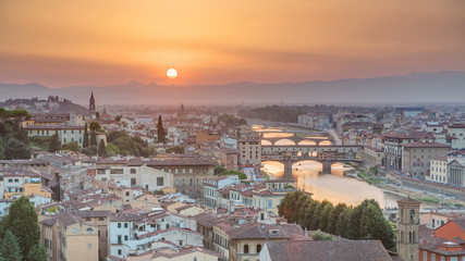 Fototapeta na wymiar Scenic Skyline View of Arno River timelapse, Ponte Vecchio from Piazzale Michelangelo at Sunset, Florence, Italy.