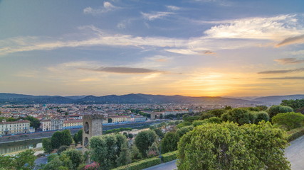 Sunrise top view of Florence city timelapse with arno river bridges and historical buildings