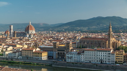Fototapeta na wymiar Florence aerial cityscape view timelapse from Michelangelo square on the old town with Santa Croce church in Italy