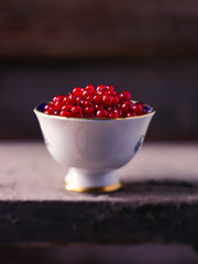 redcurrants in a small cup