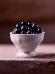 blackcurrants in small cup