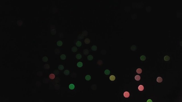 Bokeh scroll swaying black background