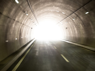 Abstract picture of speed motion blur in the tunnel road at a high speed for vehicle