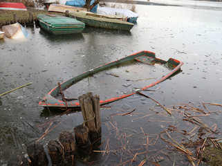 Broken Little Boat on the ice