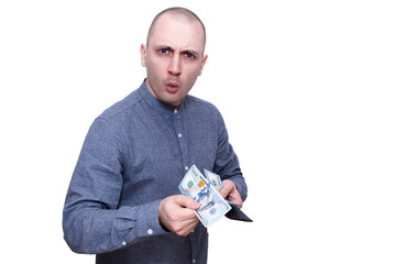 Man with cash surprised about the price