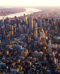 NYC Midtown Aerial. Sprawling City at sunrise, Telephoto compressed. Rush hour, busy