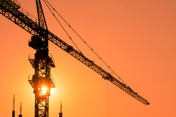 tower crane with sunset background