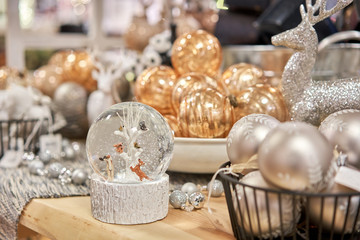 Market of decor . Lots of christmas decoration in store. Christmas shopping for new year tree.