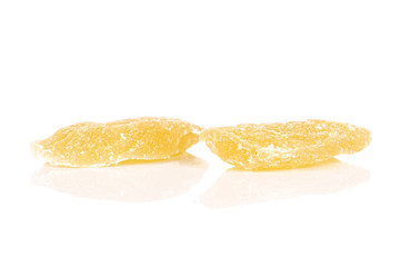 Group of two slices of dried yellow pineapple isolated on white background
