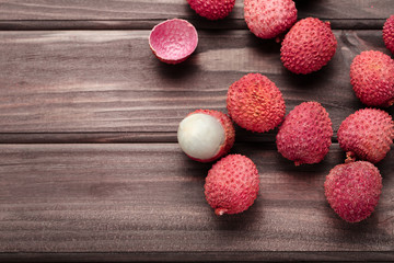 Tasty lychee on wooden table