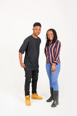 Obraz premium beautiful young couple man and woman on a white background