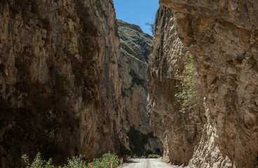 Road through chasm. Gorge. At the goldmine of Antamina Peru. Mountains.