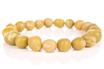 Lot of whole canned pea ring isolated on white background