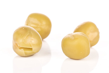 Group of four whole canned pea isolated on white background
