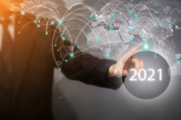 2021,Business men show networking patterns in the year 2021 in virtual graphics Network technology concepts in 2021.Element of this image furnished by Nasa