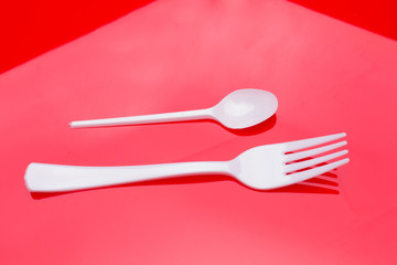 white and plastic food cutlery