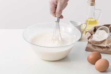 dough in glass plate and products for its preparation on  white