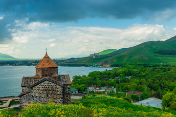 Fototapeta na wymiar Tourist site of Armenia Sevanavank Monastery on the shore of Lake Sevan