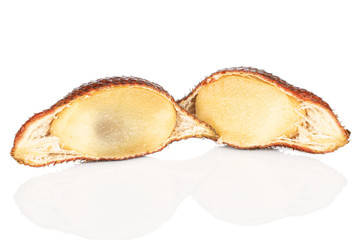 Group of two halves of exotic brown salak isolated on white background