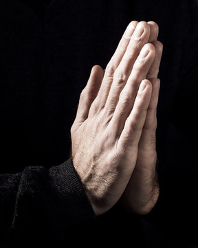 male hands praying