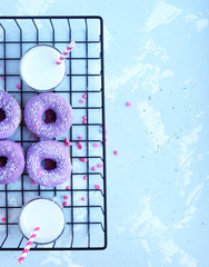 multicolored donuts in a basket with icing, top view, side view