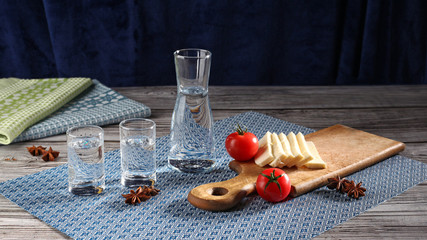 Fototapeta na wymiar Traditional greek ouzo in shot glasses